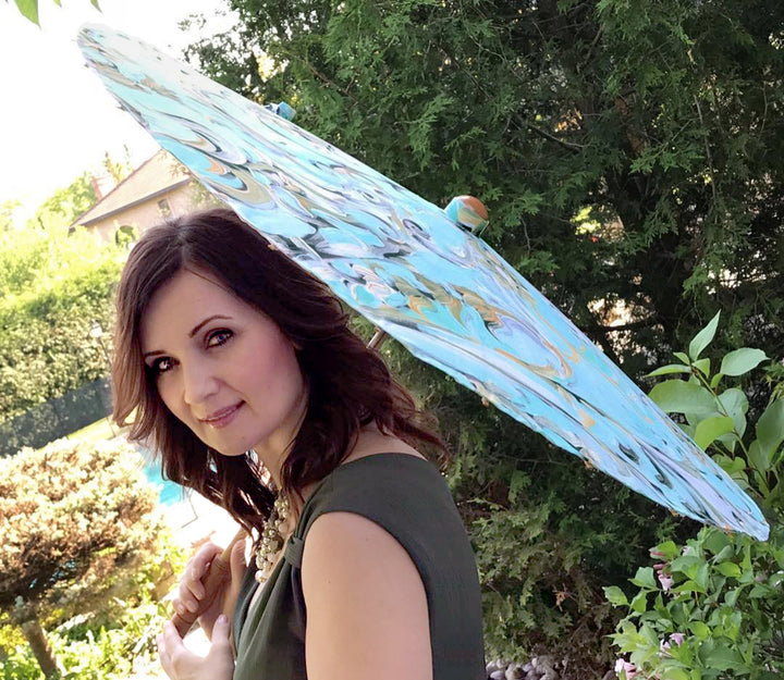 Is this the summer you start carrying a sun parasol?